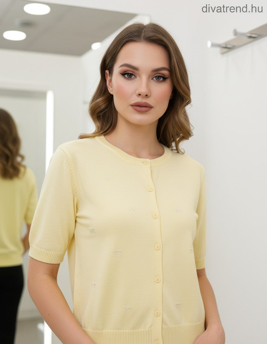 sárga kötött kardigán rövid ujjú masnikkal