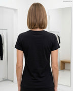 női pamut póló noncelapossofare felirattal hátulról