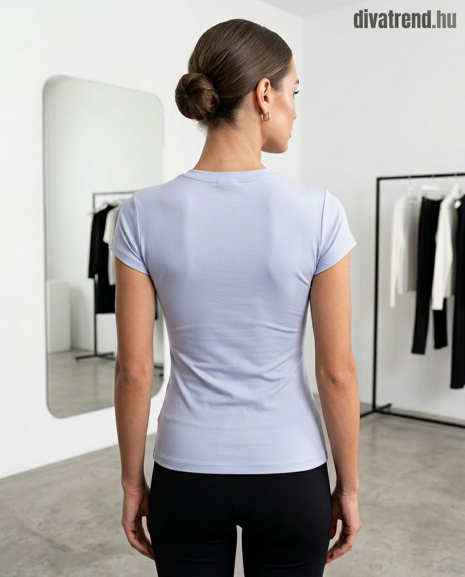 elegáns női póló asszimetrikus kivágással, díszcsattal hátulról