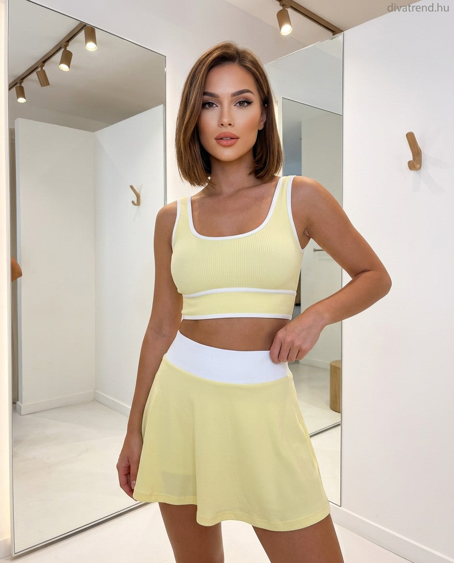 sárga sportos női szett, miniszoknya és bordázott crop top